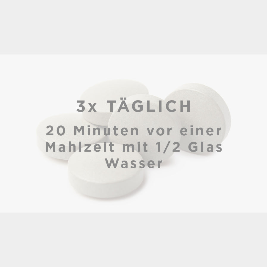 Tabletten mit Text "3x Täglich 20 Minuten vor einem Mahlzeit mit 1/2 Glas Wasser"